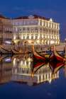 Gondola style fishing tour boats in canal in Aveiro, Portugal Art Print